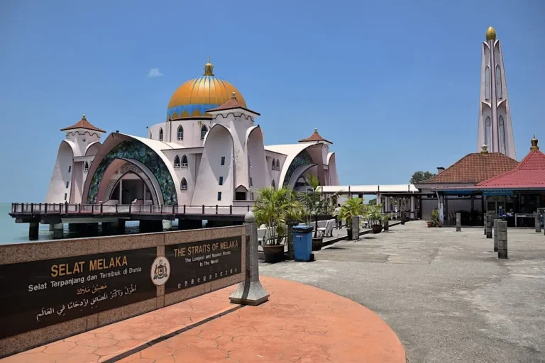 view Straits Malacca Mosque with the signage